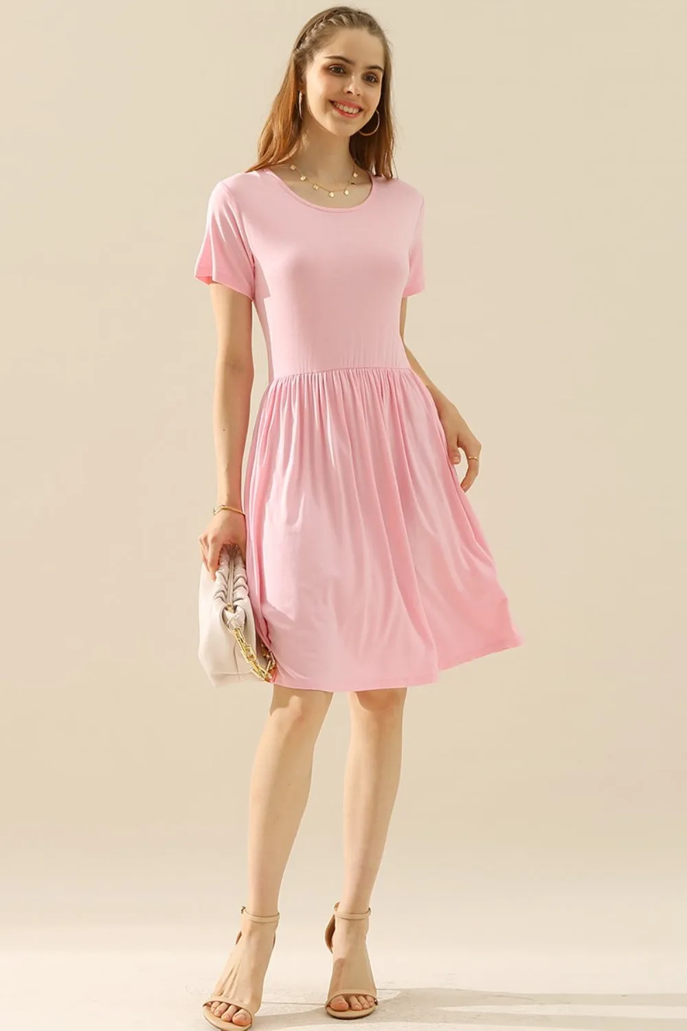 Ninexis Full Size Round Neck Ruched Dress with Pockets sold by Leota