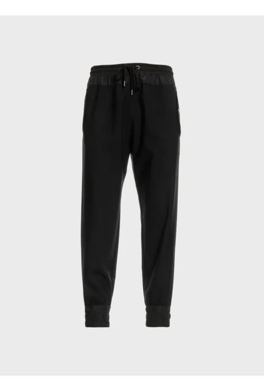 Comfy pant with nylon wastelight wool sold by Les Hommes