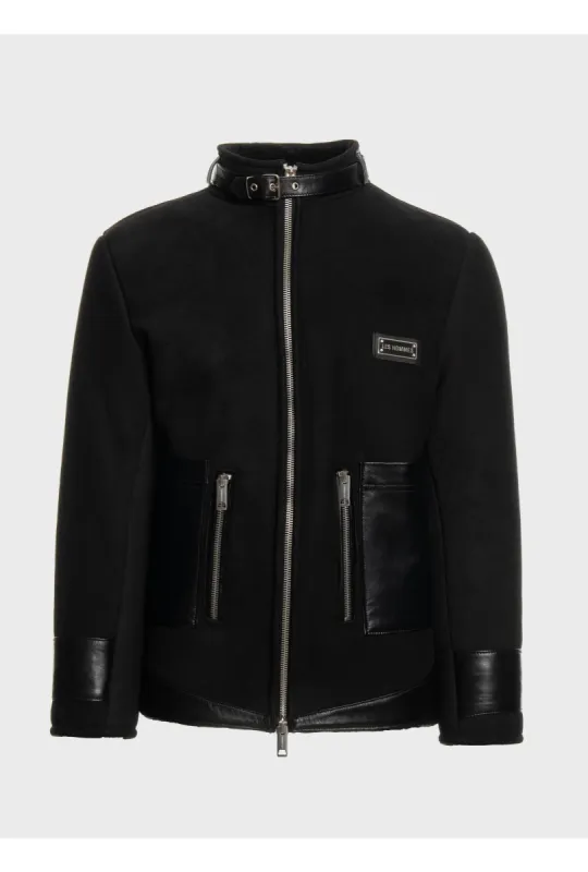 Shearling jacket + leather pockets sold by Les Hommes