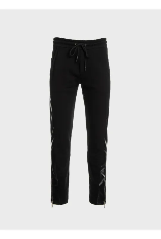 Jogging with bottom zips sold by Les Hommes