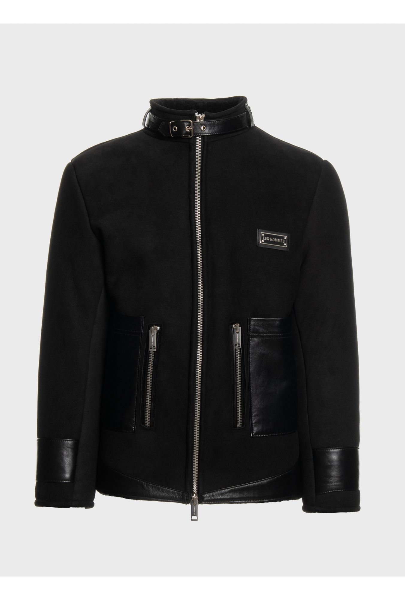 Shearling jacket + leather pockets sold by Les Hommes