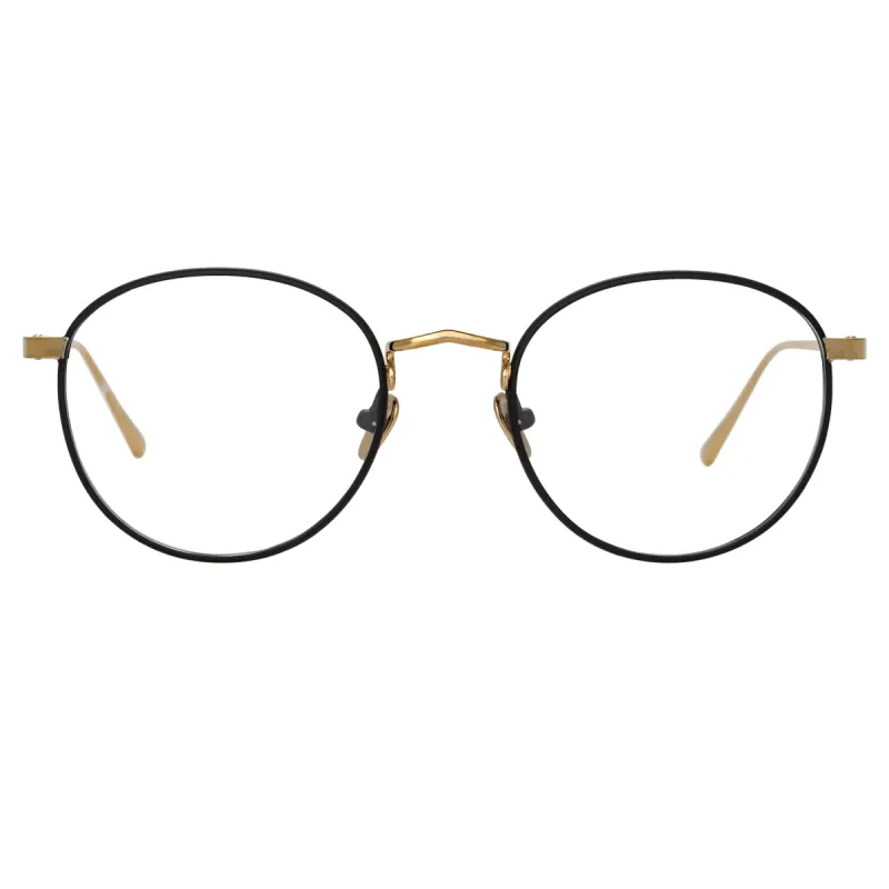 The Harrison | Oval Optical Frame in Black and Light Gold (C3) sold by Linda Farrow