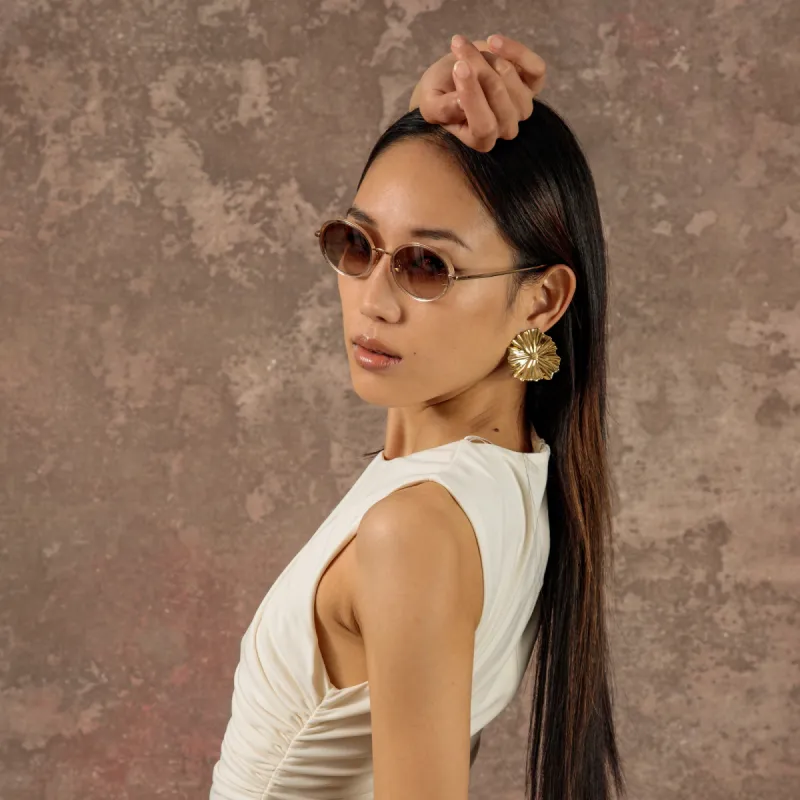 Finn Oval Sunglasses in Rose Gold sold by Linda Farrow