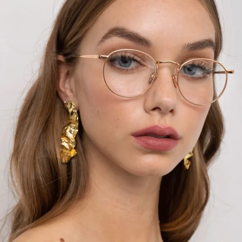 Bronson Oval Optical Frame in Rose Gold sold by Linda Farrow