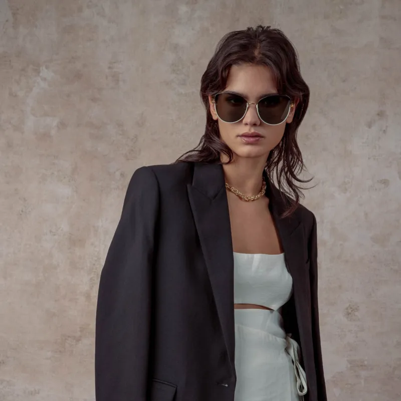 Eloise Cat Eye Sunglasses in Black and Yellow Gold sold by Linda Farrow