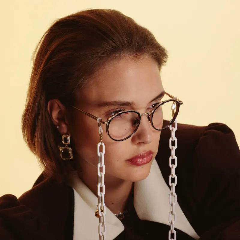 Cesar Angular Optical Frame in Yellow Gold and Black sold by Linda Farrow