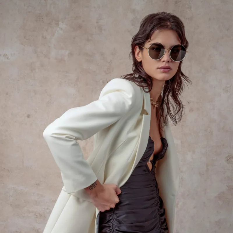 Bea Round Sunglasses in Yellow Gold and Black sold by Linda Farrow