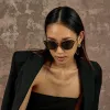Song Cat Eye Sunglasses in Yellow Gold and Black sold by Linda Farrow