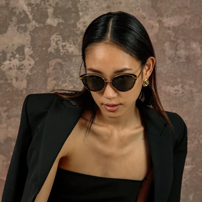 Song Cat Eye Sunglasses in Yellow Gold and Black sold by Linda Farrow