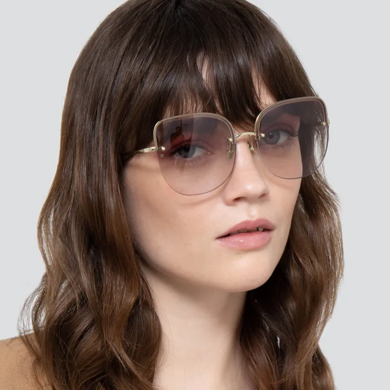 Loni Cat Eye Sunglasses in Light Gold and Blue sold by Linda Farrow