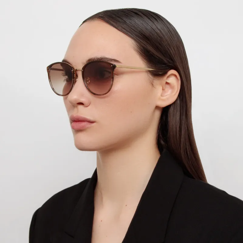 Calthorpe Oval Sunglasses in Caramel Horn sold by Linda Farrow
