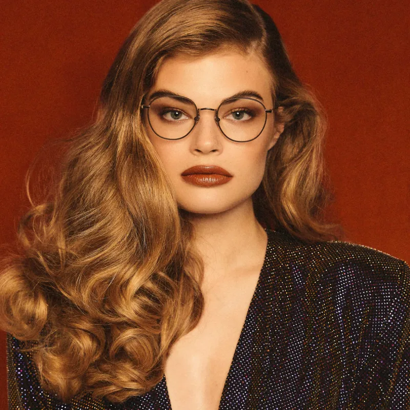 Jules Oval Optical Frame in Light Gold and Brown sold by Linda Farrow