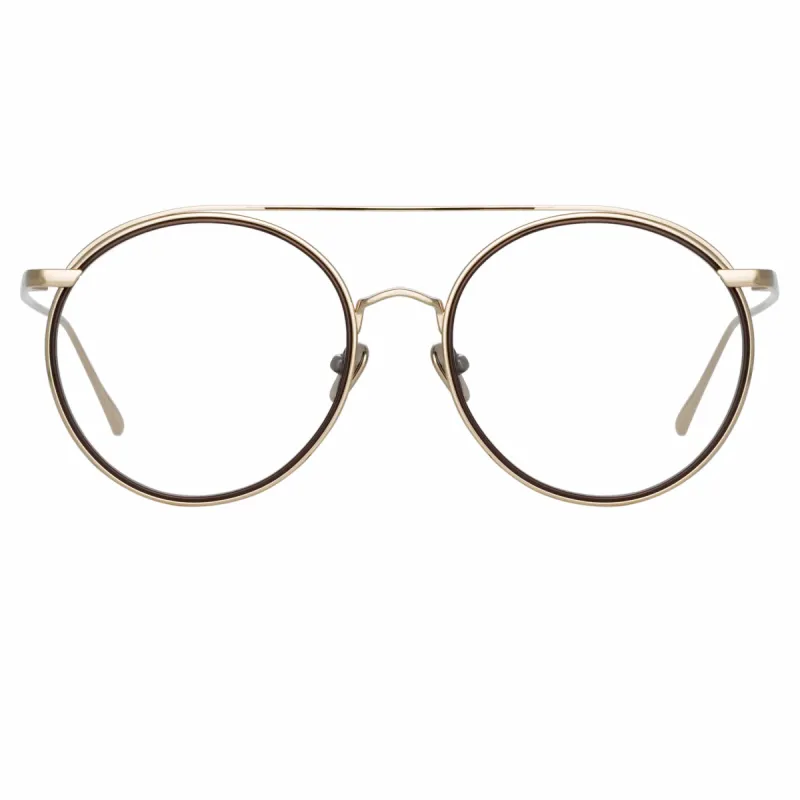 Corey Oval Optical Frame in Light Gold sold by Linda Farrow
