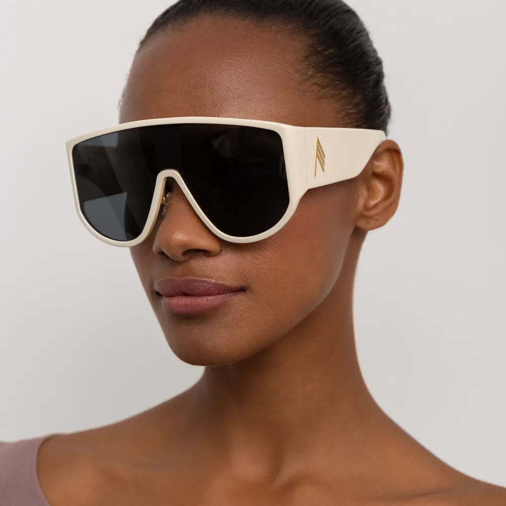 The Attico Iman Shield Sunglasses in Cream sold by Linda Farrow