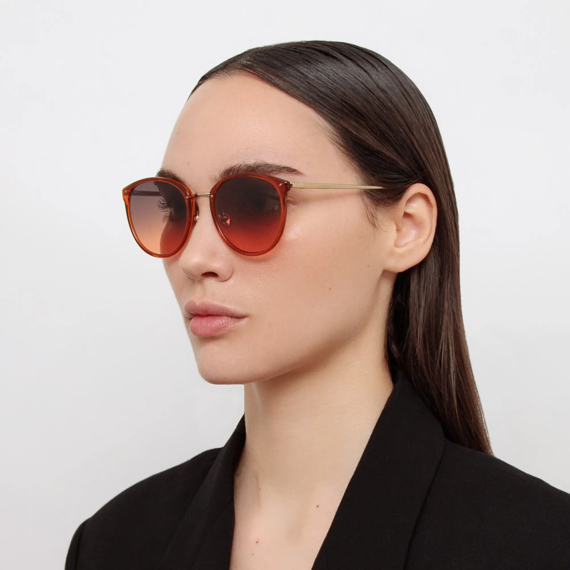 Calthorpe Oval Sunglasses in Orange sold by Linda Farrow
