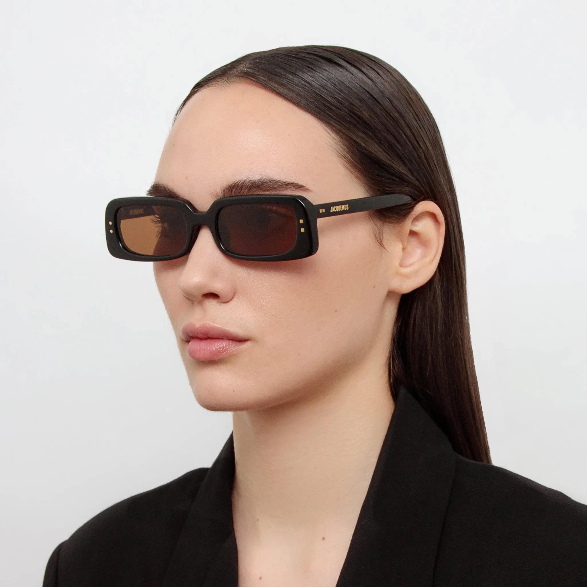 Azzurro Rectangular Sunglasses in Black by Jacquemus sold by Linda Farrow
