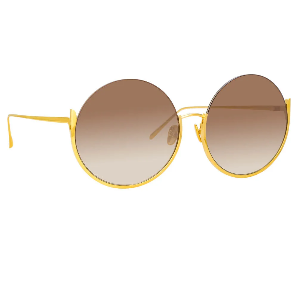 Olivia Round Sunglasses in Yellow Gold sold by Linda Farrow