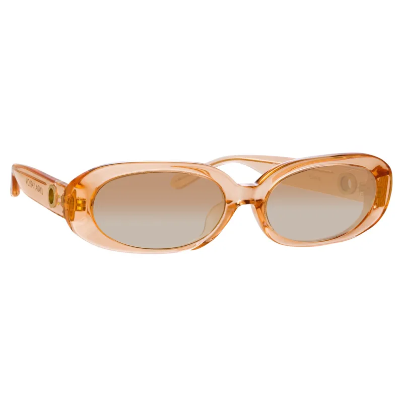 Cara Oval Sunglasses in Peach sold by Linda Farrow