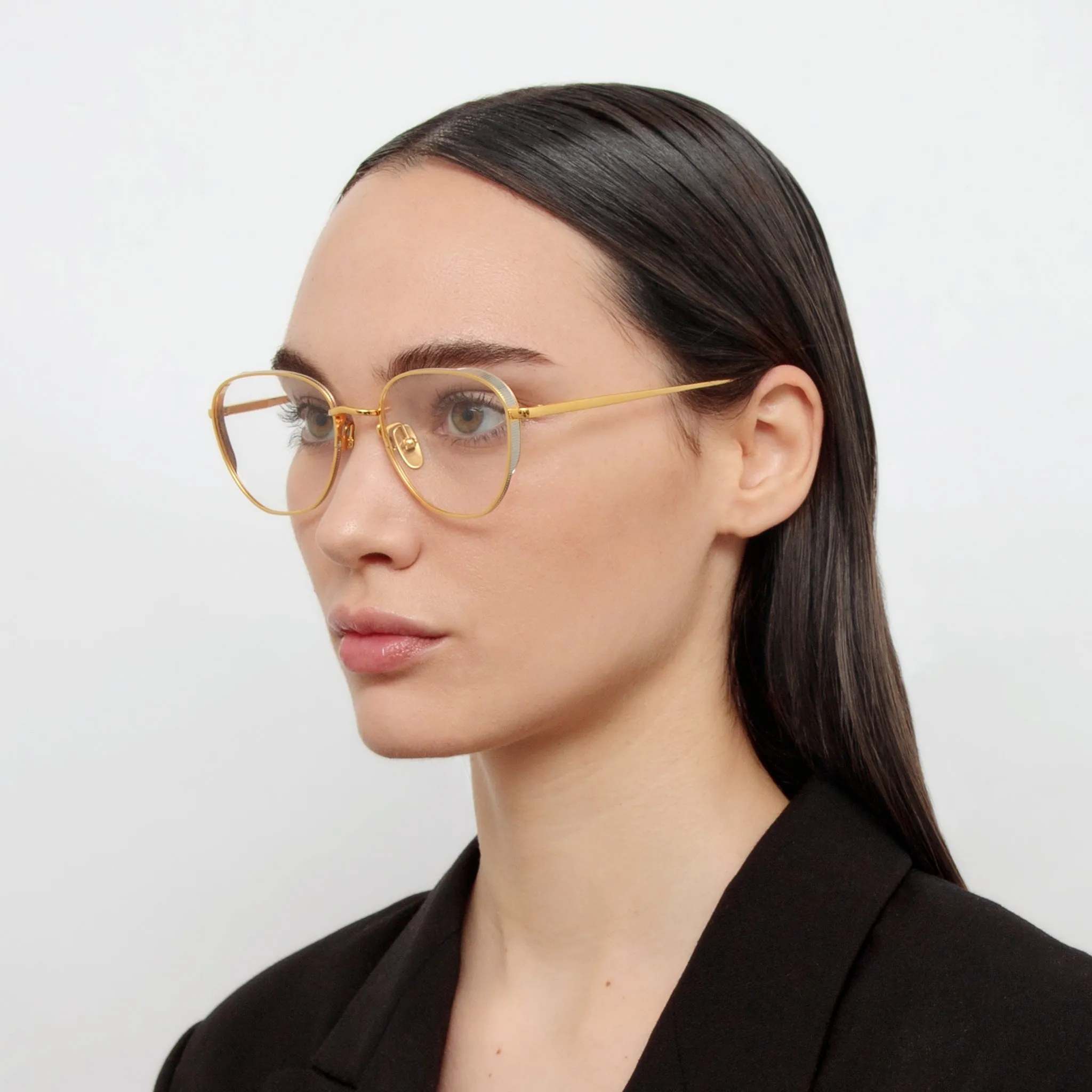 Hardy Oval Optical Frame in Yellow Gold sold by Linda Farrow