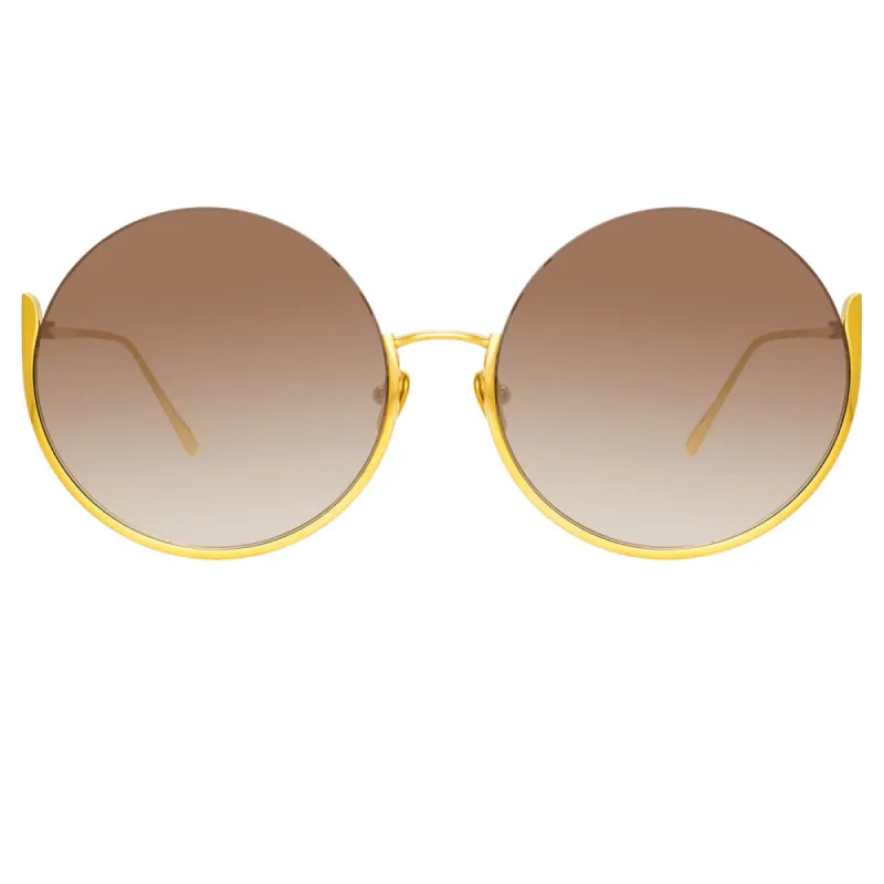 Olivia Round Sunglasses in Yellow Gold sold by Linda Farrow