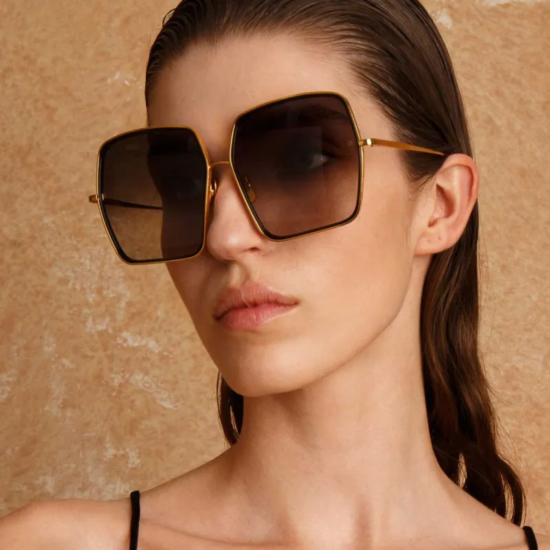 Camaro Oversized Sunglasses in Yellow Gold sold by Linda Farrow