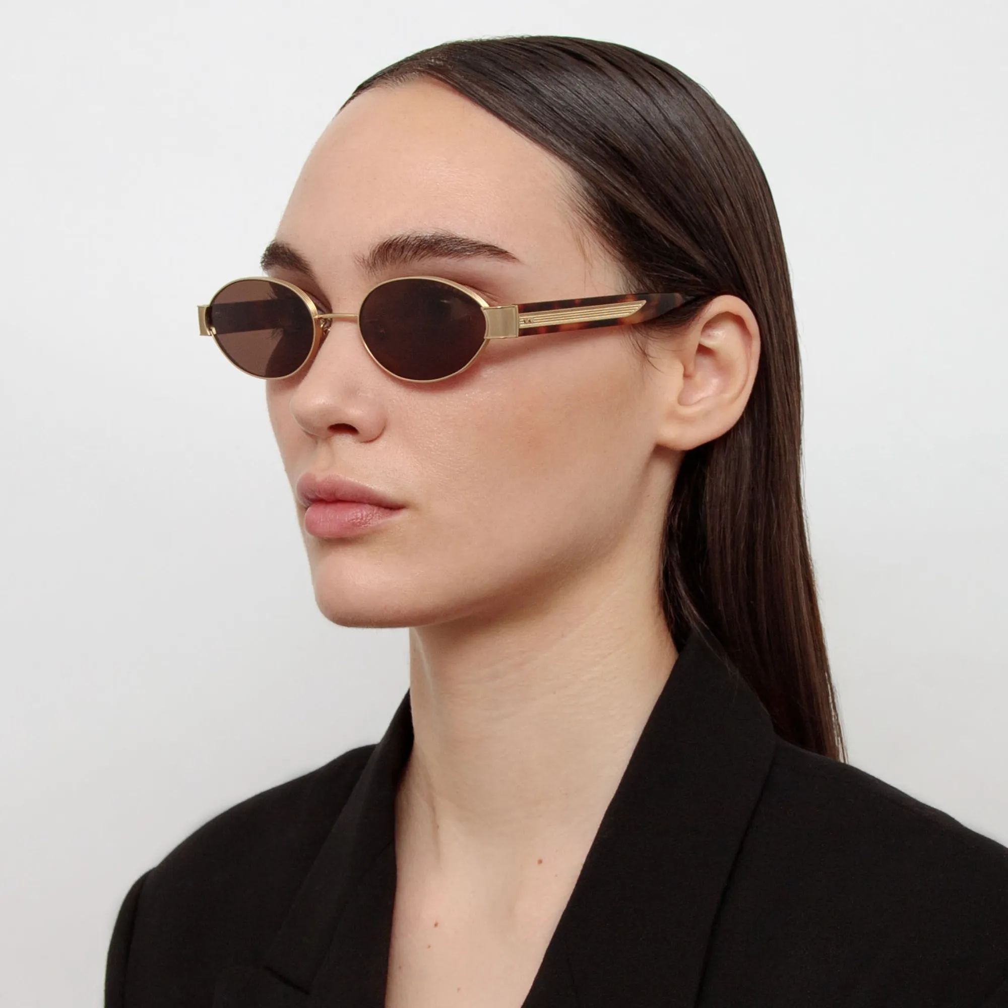 Sadie Oval Sunglasses in Light Gold sold by Linda Farrow