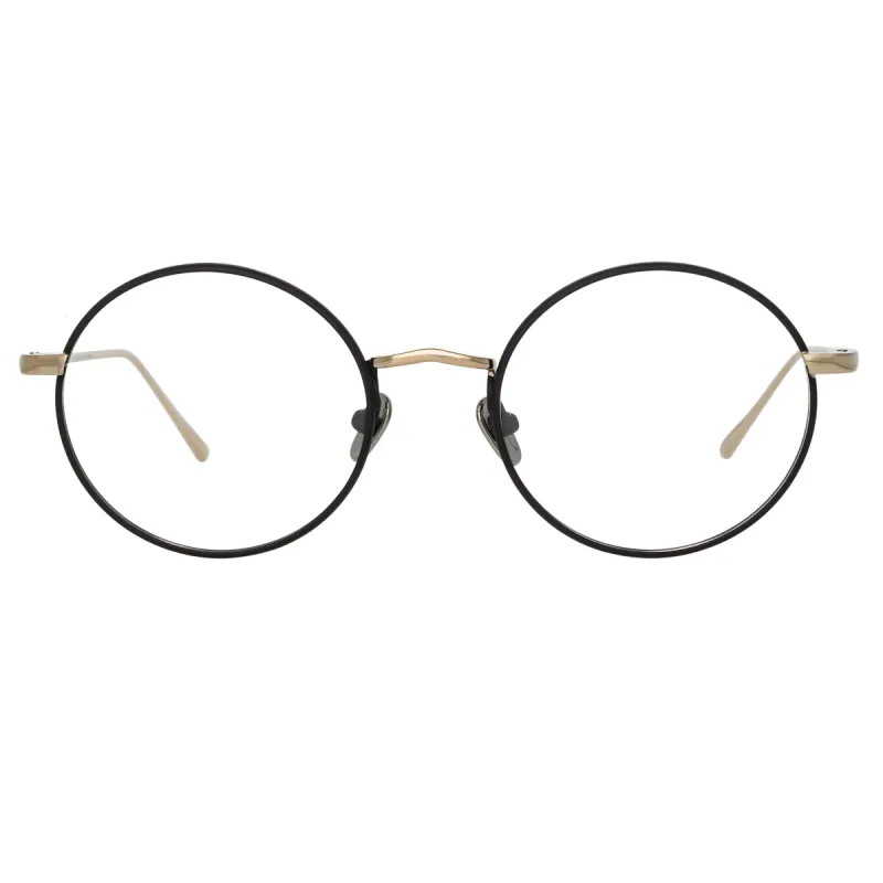 Adams Oval Optical Frame in Black and Light Gold sold by Linda Farrow