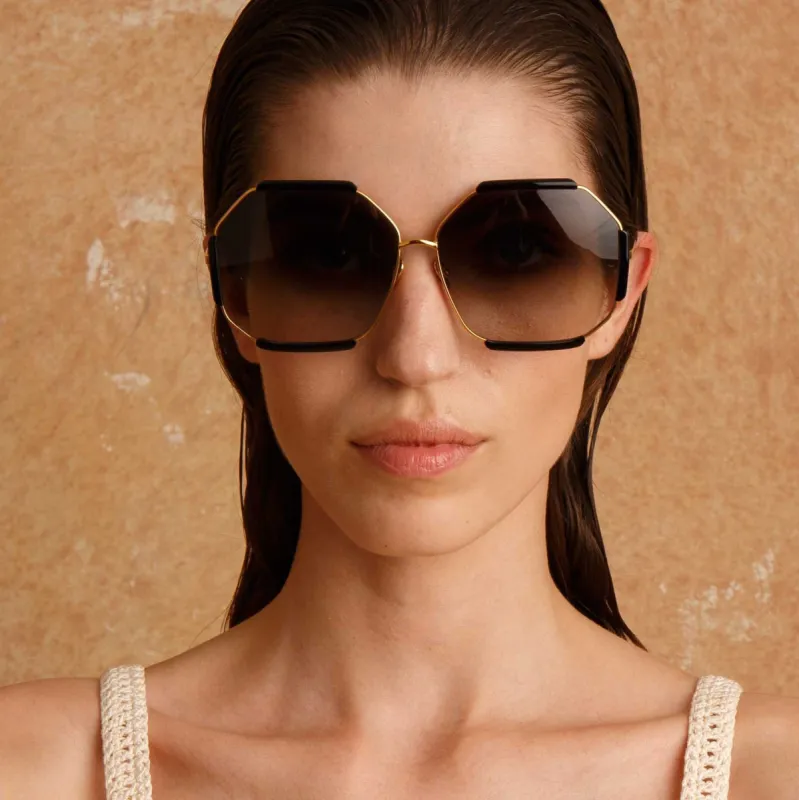 Margot Hexagon Sunglasses in Black sold by Linda Farrow