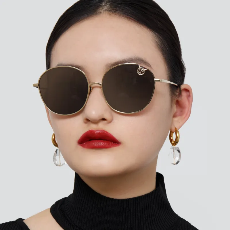 Hannah Cat Eye Sunglasses in Light Gold and Brown sold by Linda Farrow