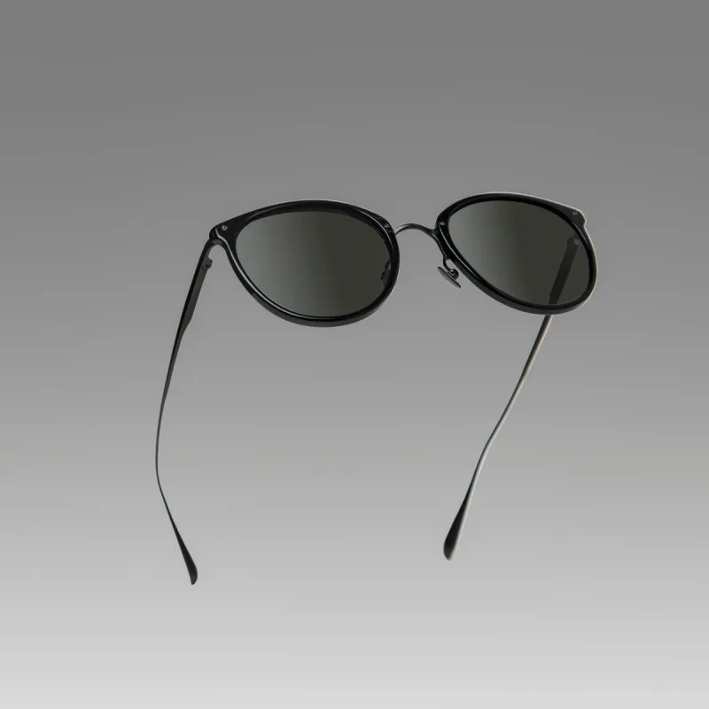 Calthorpe Oval Sunglasses in Black and Matt Nickel sold by Linda Farrow
