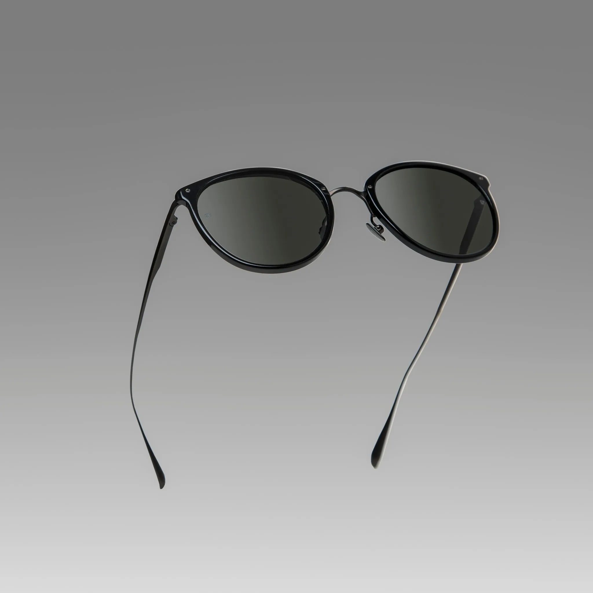 Calthorpe Oval Sunglasses in Black and Matt Nickel sold by Linda Farrow