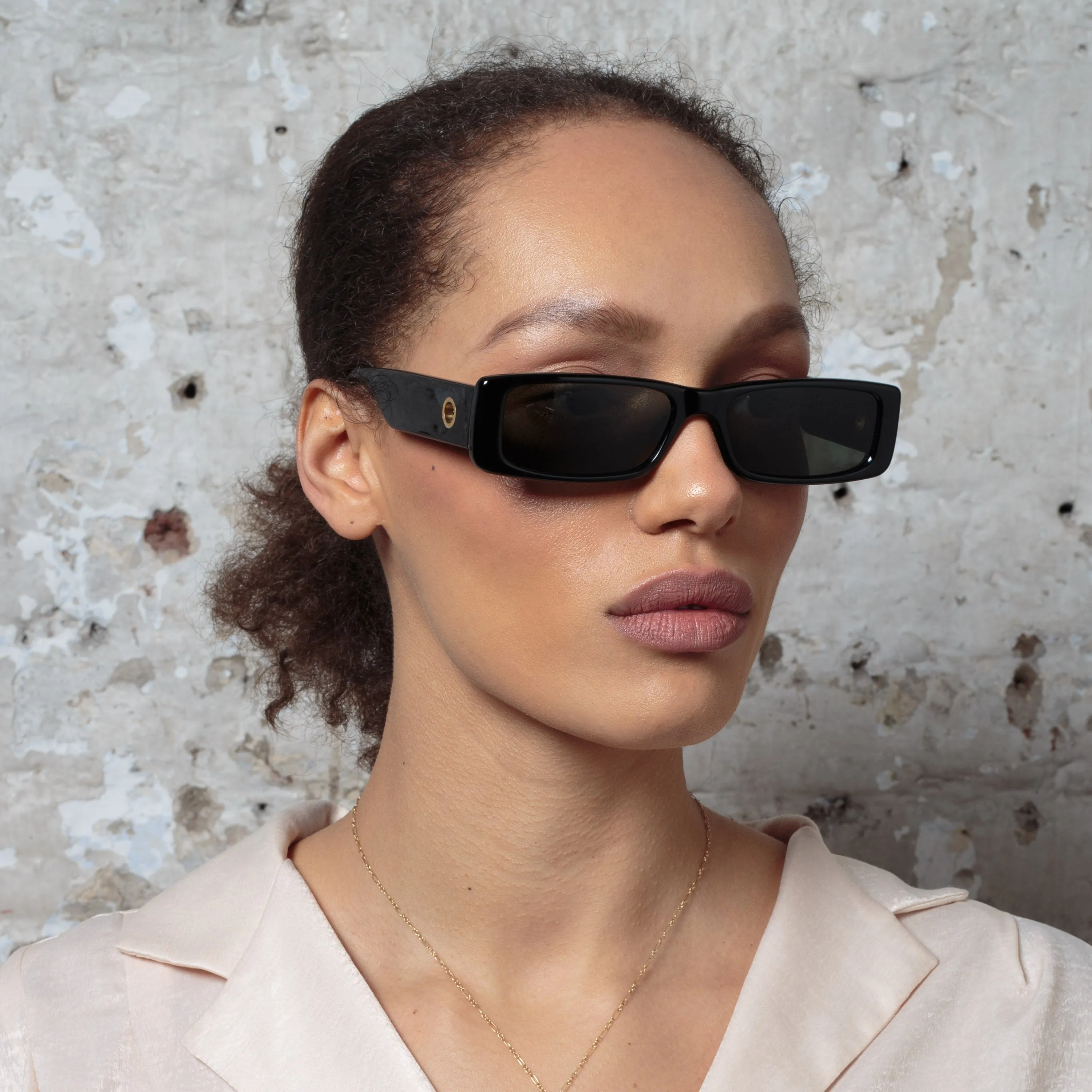 Dania Rectangular Sunglasses in Black sold by Linda Farrow