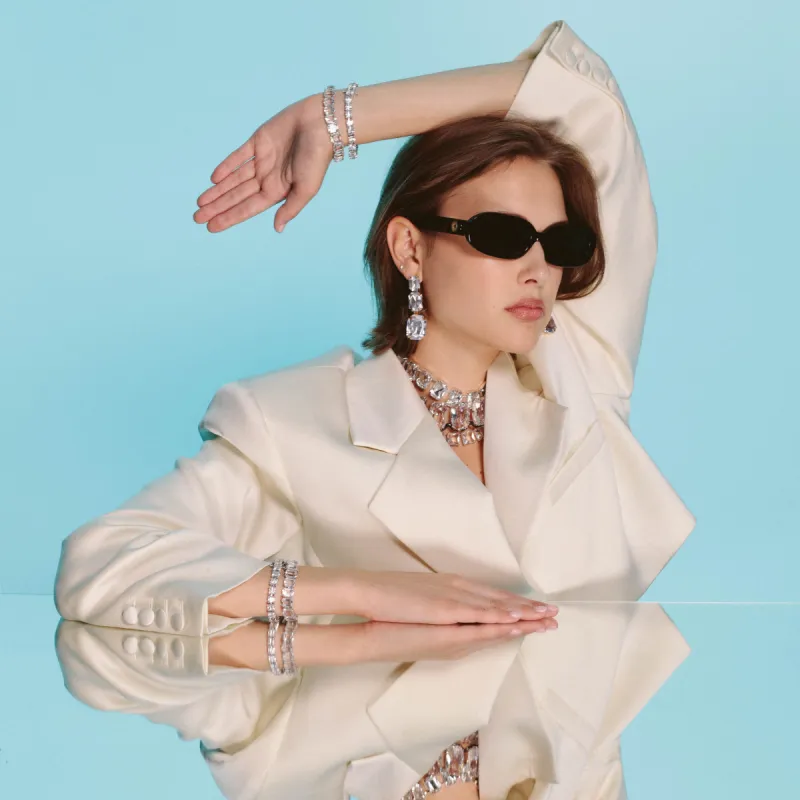 Cara Oval Sunglasses in Black sold by Linda Farrow