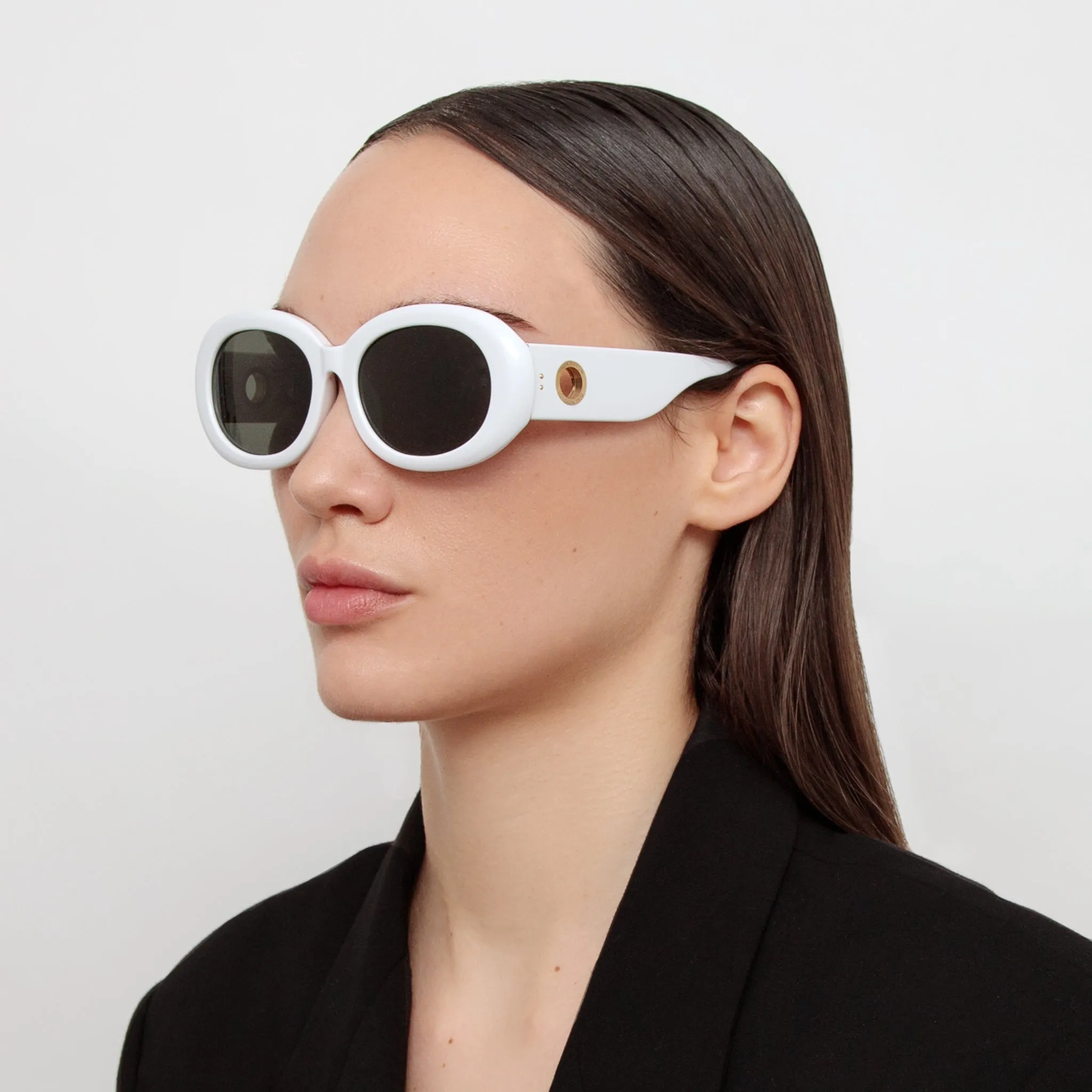 Lina Oval Sunglasses in White sold by Linda Farrow