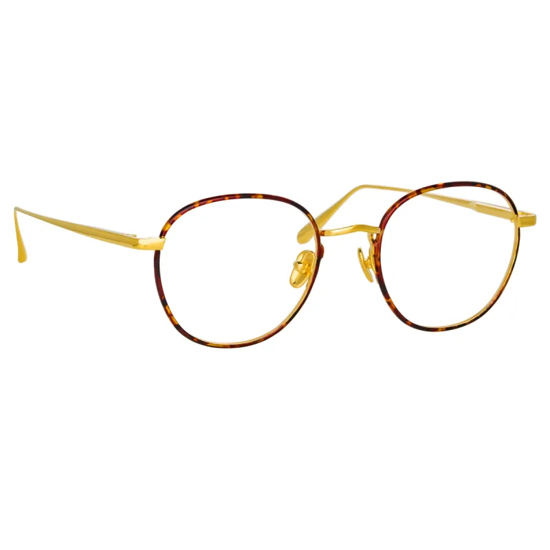 Jules Oval Optical Frame in Yellow Gold and Tortoiseshell sold by Linda Farrow