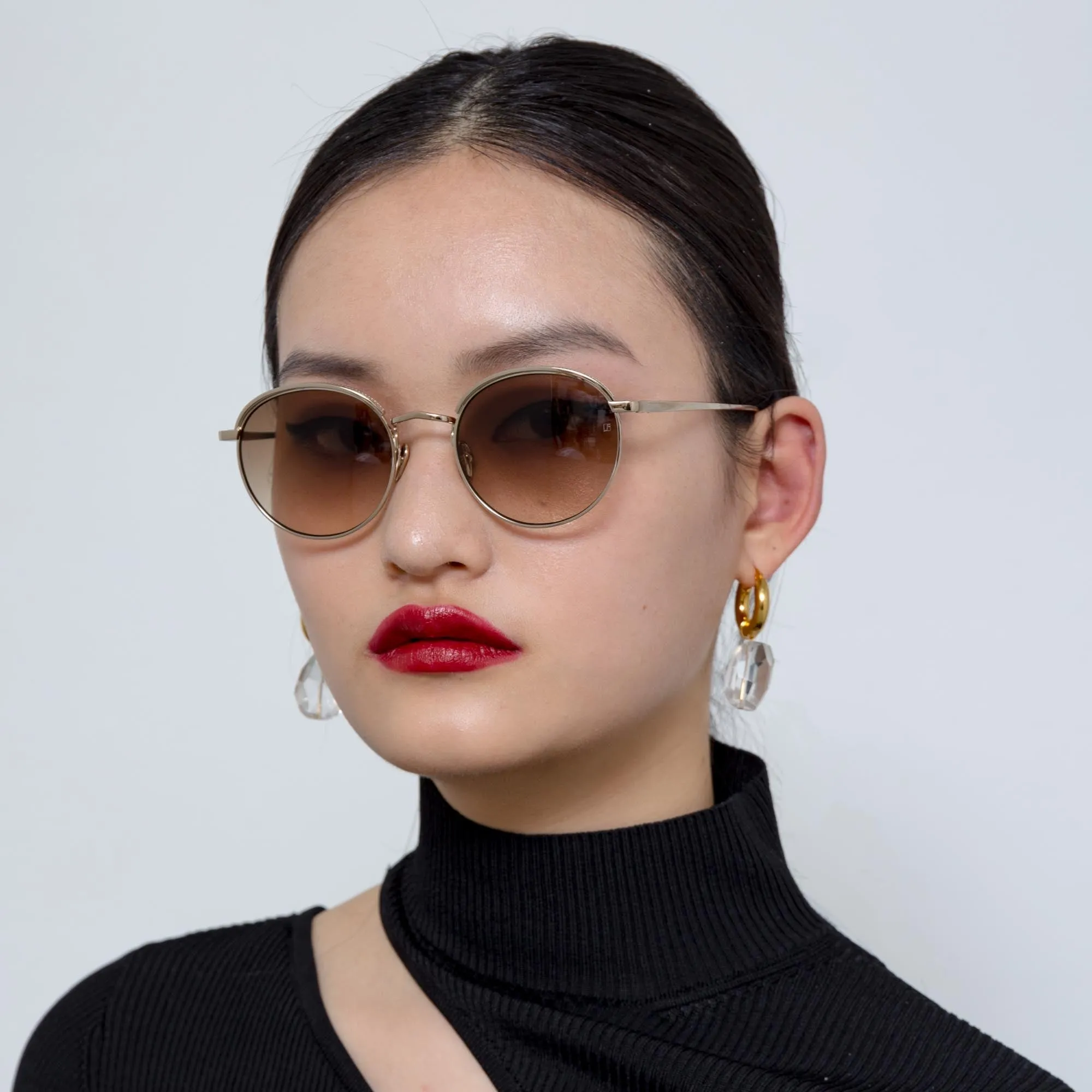 Marlon Oval Sunglasses in Light Gold and Mocha sold by Linda Farrow