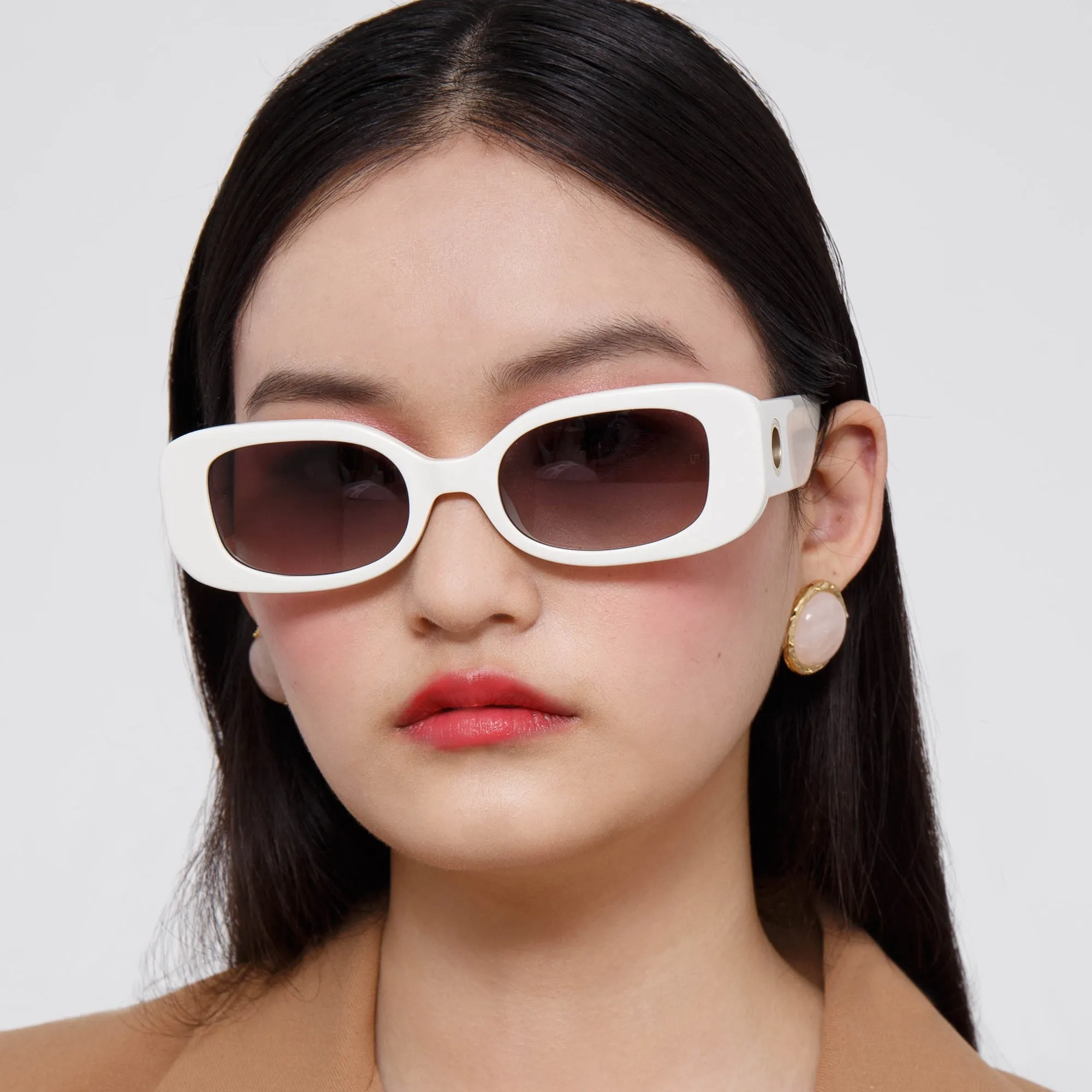 Lola Rectangular Sunglasses in White sold by Linda Farrow