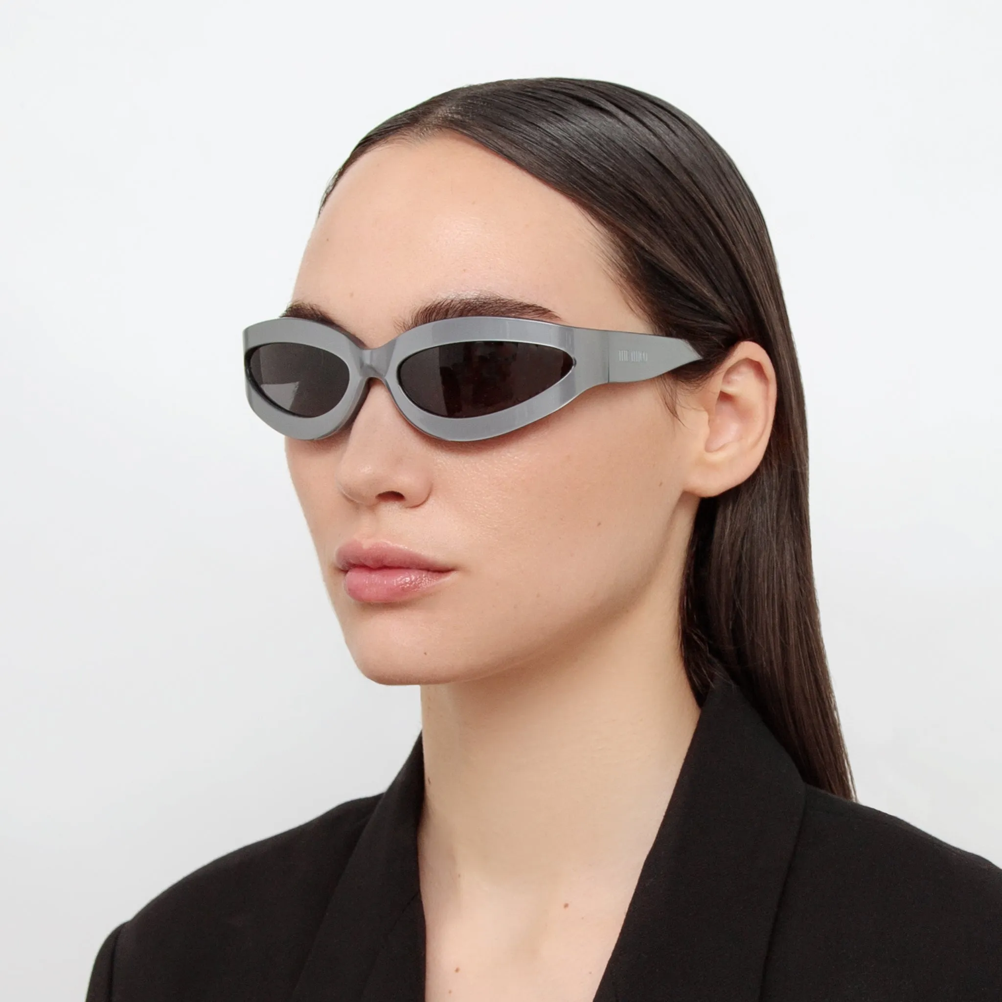 Agnes Wrap Sunglasses in Silver sold by Linda Farrow