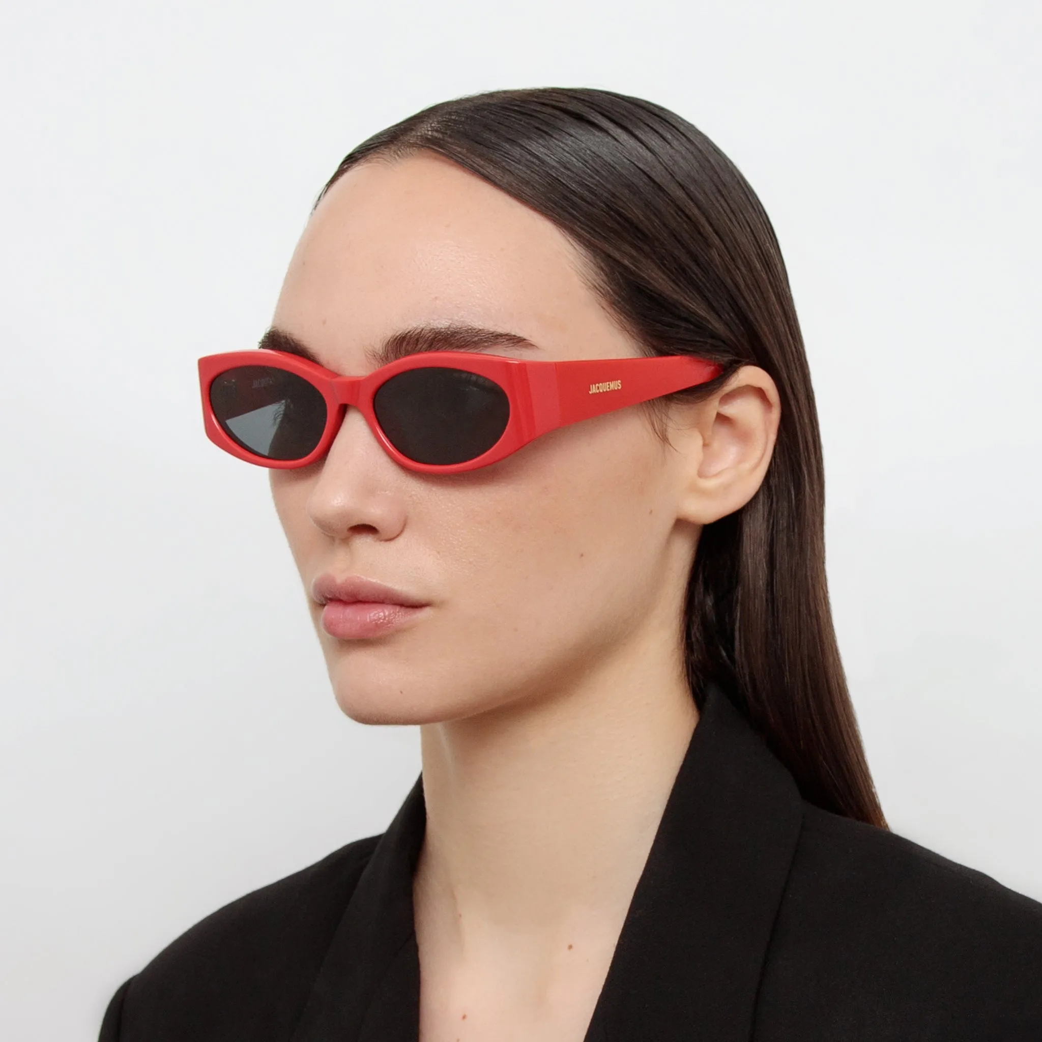 Ovalo Oval Sunglasses in Red by Jacquemus sold by Linda Farrow