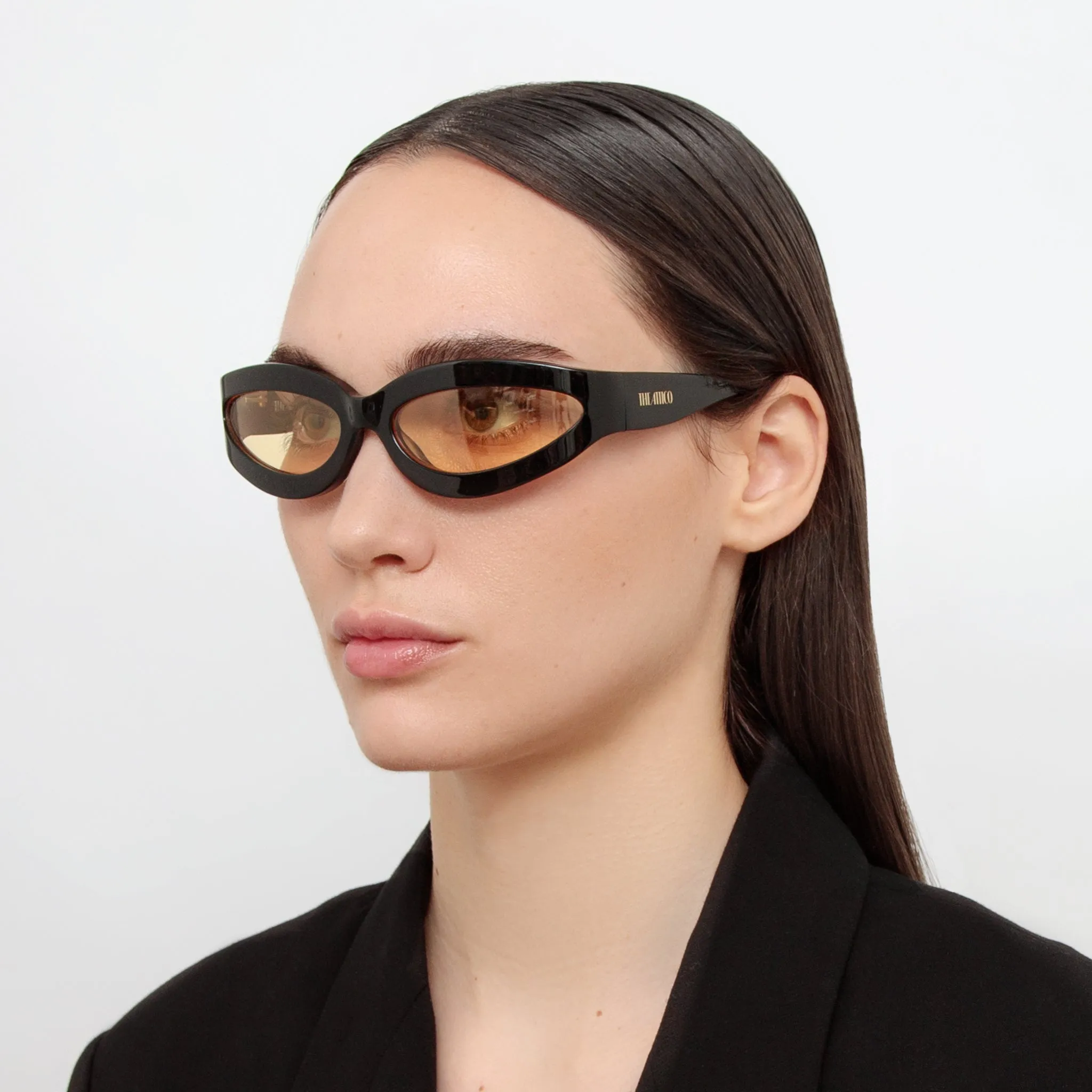 Agnes Wrap Sunglasses in Black and Yellow sold by Linda Farrow