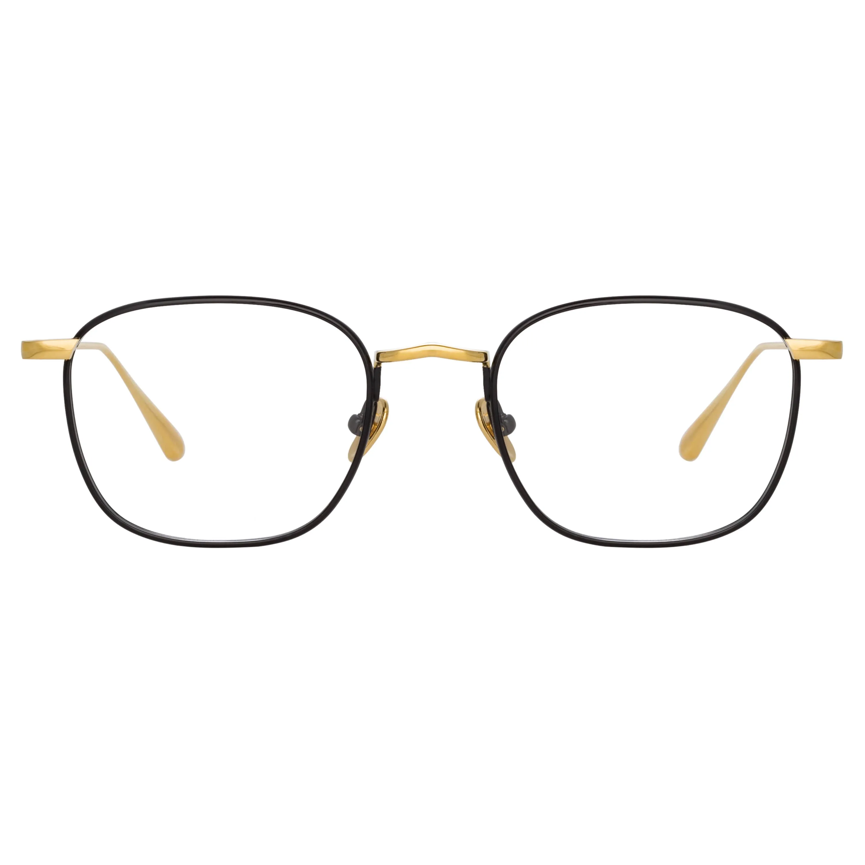 Hendrik Oval Optical Frame in Yellow Gold and Black sold by Linda Farrow