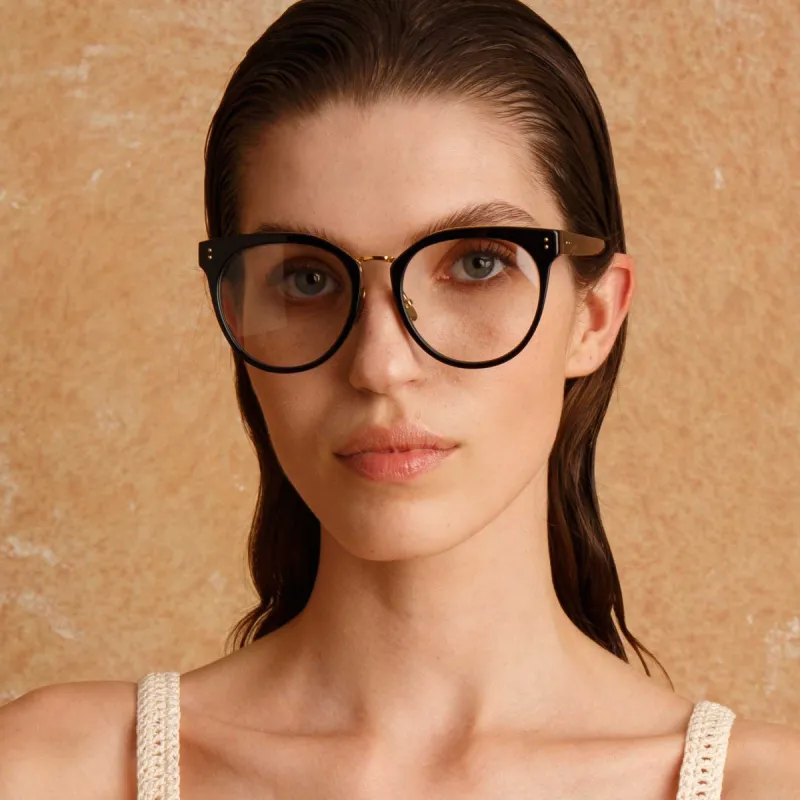 Carla Oval Optical Frame in Black sold by Linda Farrow
