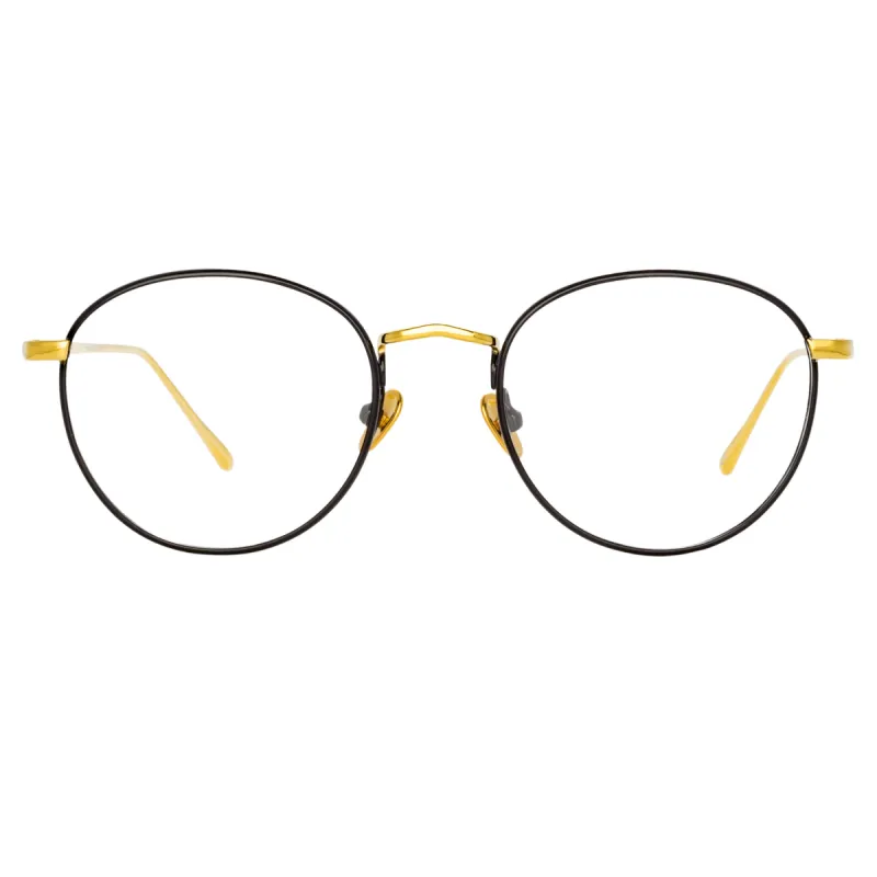 The Harrison | Oval Optical Frame in Black and Yellow Gold sold by Linda Farrow