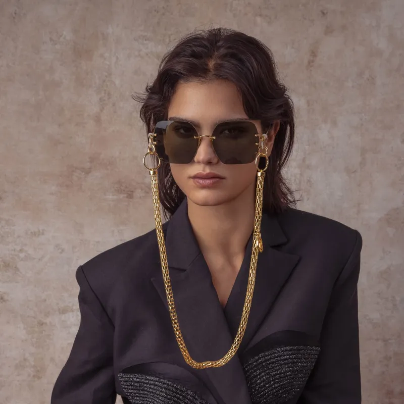 Carina Oversized Sunglasses in Yellow Gold sold by Linda Farrow