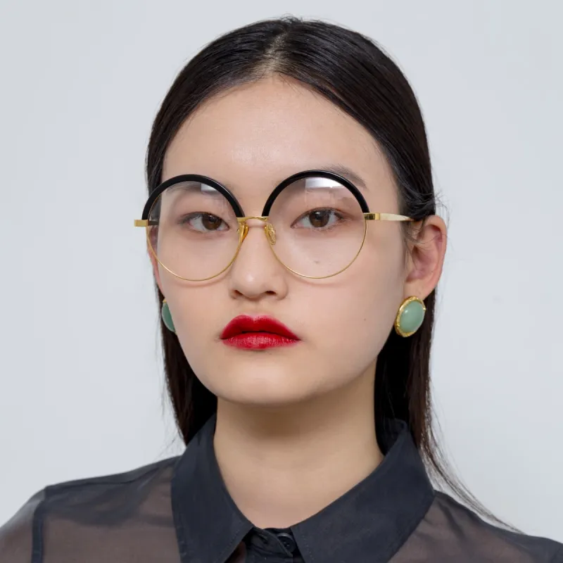 Annie Round Optical Frame in Black and Yellow Gold sold by Linda Farrow