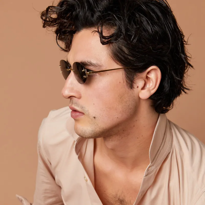 Knight Oval Sunglasses in Yellow Gold made by Linda Farrow