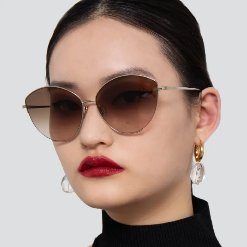 Ella Cat Eye Sunglasses in Light Gold and Brown sold by Linda Farrow