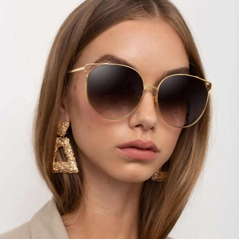 Joanna Oversized Sunglasses in Yellow Gold sold by Linda Farrow