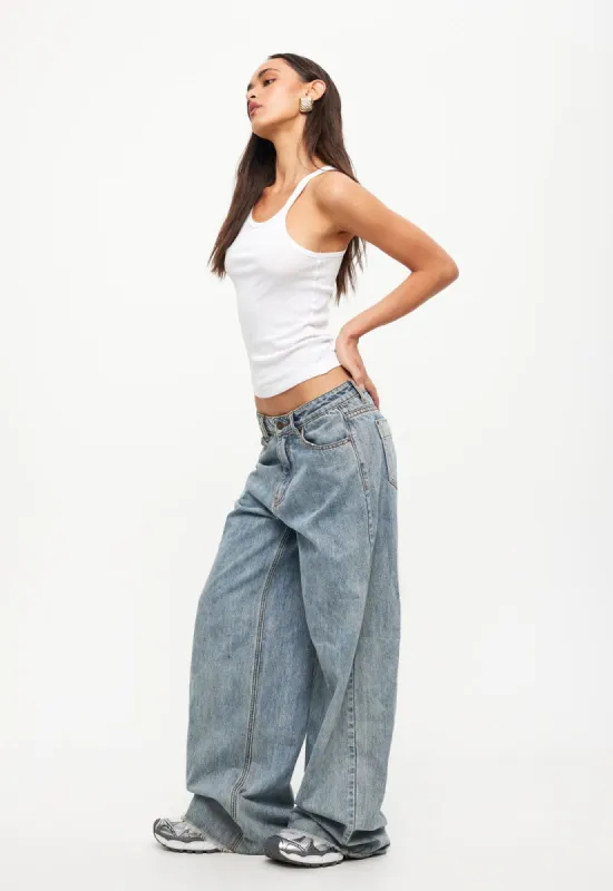EIVISSA BAGGY JEAN - FADED DENIM sold by Lioness
