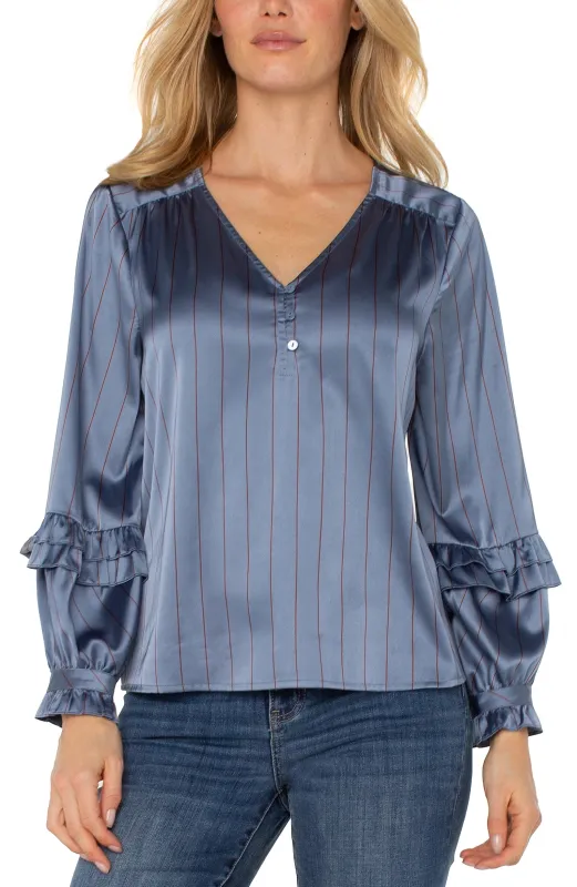 LONG SLEEVE WOVEN BLOUSE W/ RUFFLES sold by Liverpool Jeans Company